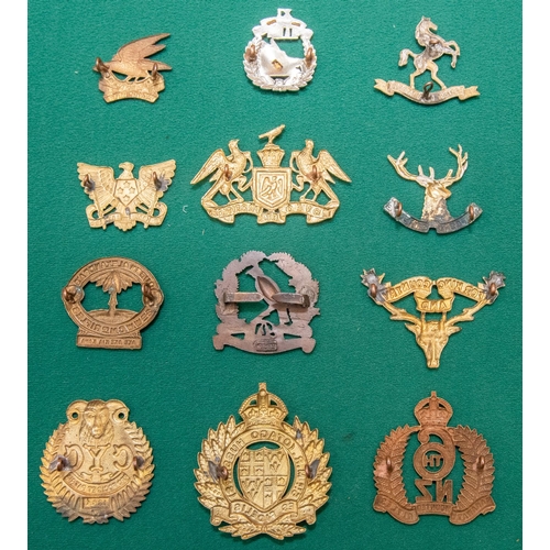 218 - A set of New Zealand Mounted Rifles cap badges, from 1st to 12th, the majority New Zealand made with... 