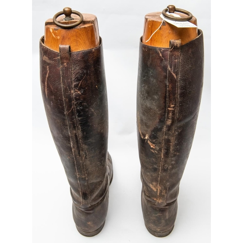 300 - A pair of WWI officers 3 strap brown boots, complete with wooden trees. Generally GC (soles AF) £50-... 