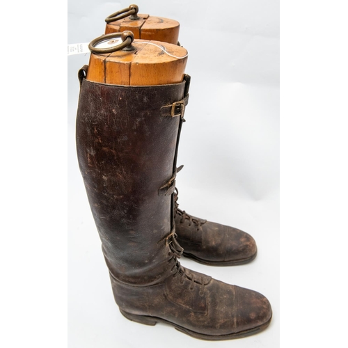 300 - A pair of WWI officers 3 strap brown boots, complete with wooden trees. Generally GC (soles AF) £50-... 