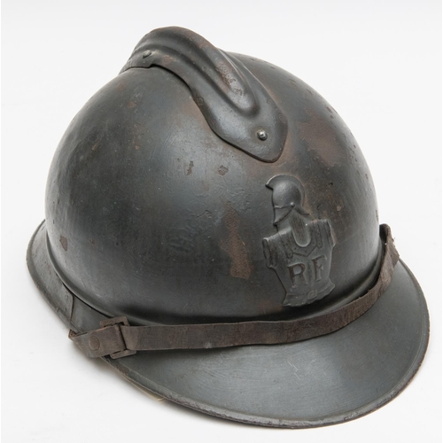 317 - A good WWI Adrian helmet, RF front badge, original leather lining and chinstrap, retains much origin... 