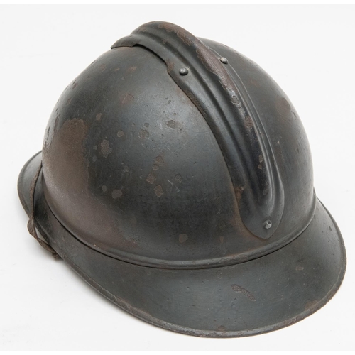 317 - A good WWI Adrian helmet, RF front badge, original leather lining and chinstrap, retains much origin... 