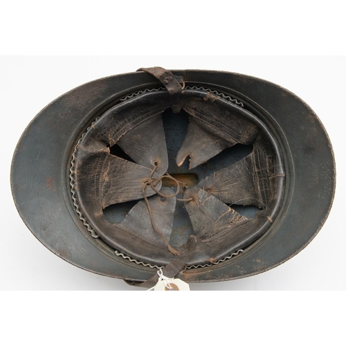 317 - A good WWI Adrian helmet, RF front badge, original leather lining and chinstrap, retains much origin... 