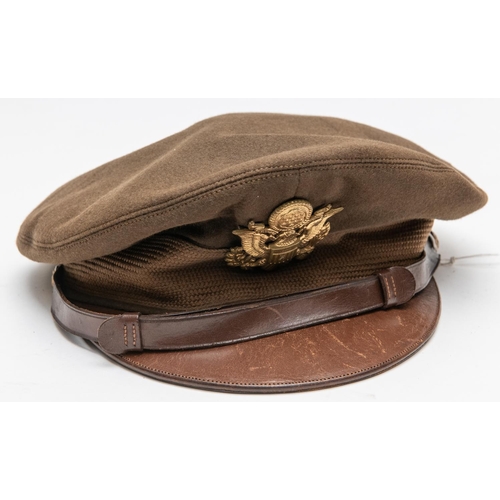 318 - A WWII US Army officers peaked SD cap, gilt badge, brown leather peak and  chinstrap. GC £70-75