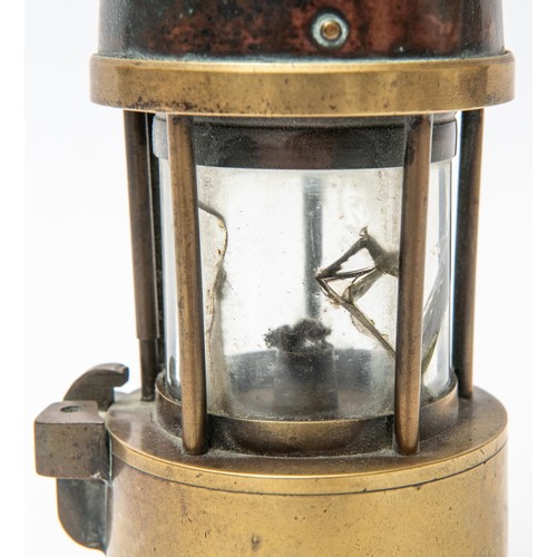 18 - An miner's old brass lamp, 