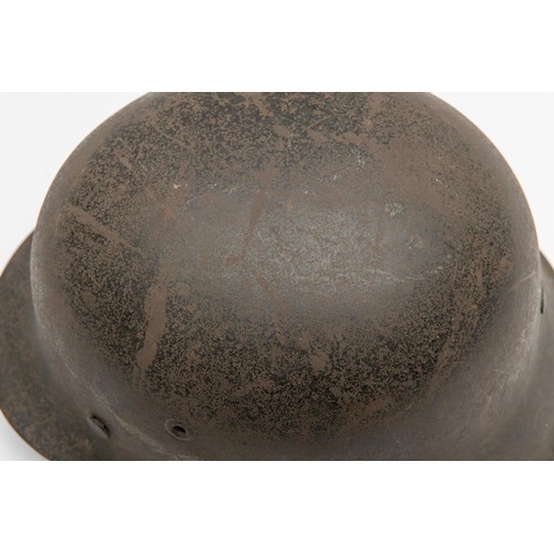 103 - A Third Reich Luftwaffe M43 raw edge steel helmet, decal on left side, complete with lining and chin... 