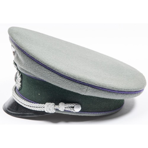 108 - A Third Reich Army Chaplain's cap, with silver wire badge and cords, purple piping, and maker's name... 