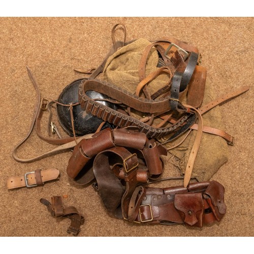 152 - A civilian rucksack, 2 1903 pattern ammunition bandoliers, a civilian cartridge belt, various straps... 