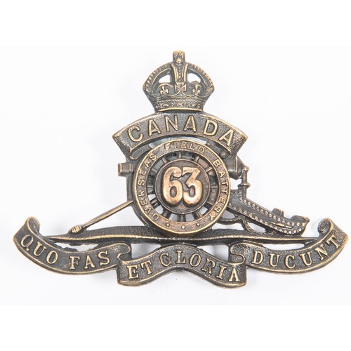 202 - WWI Canadian CEF 63rd Overseas Field Battery Canadian Field Artillery cap badge, with two lugs. GC £... 