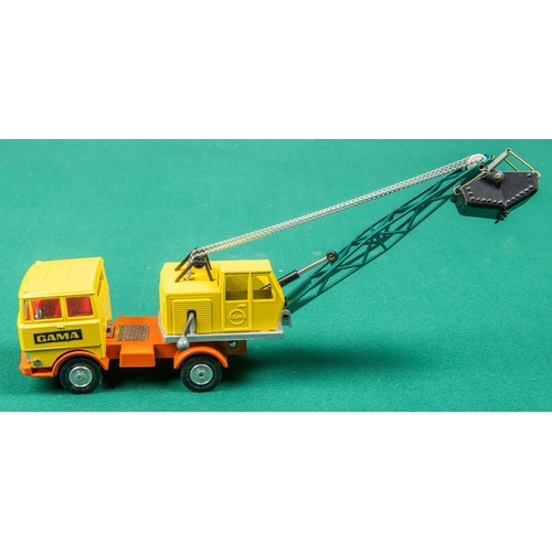 227 - GAMA 'MINI GAMA' Faun-LKW mit Greiferbagger', truck with mechanical bucket on jib. In yellow, orange... 