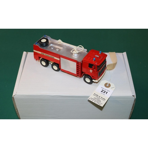 231 - An Alan Smith/Roxley Models Belgian Volvo 6x6 Airport Fire Truck. A white metal model finished in re... 