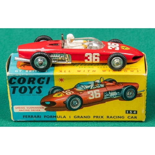 306 - 2 Corgi Toys. Cooper Maserati F/1 (156). In dark blue, RN7. Plus a  Ferrari Formula 1 Grand Prix Rac... 