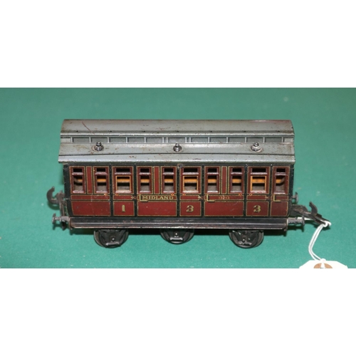 34 - A rare O gauge Carette  Clemenson 6 wheeled clearstory passenger coach. A composite 1st/3rd class co... 