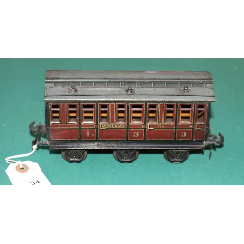 34 - A rare O gauge Carette  Clemenson 6 wheeled clearstory passenger coach. A composite 1st/3rd class co... 