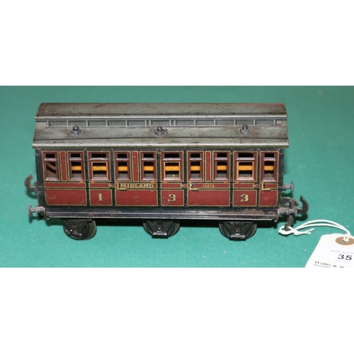 35 - A rare O gauge Carette  Clemenson 6 wheeled clearstory passenger coach. A composite 1st/3rd class co... 