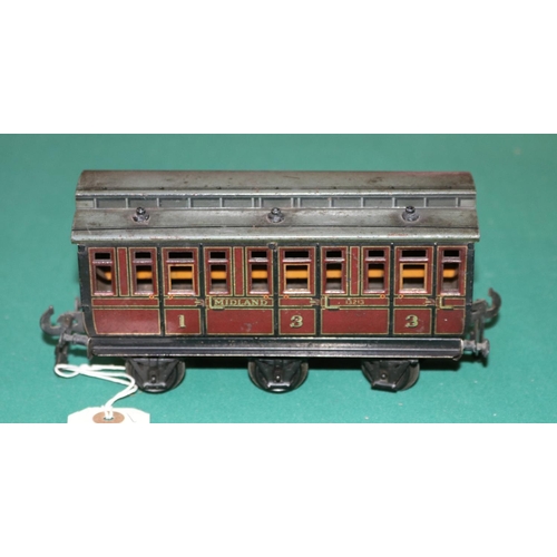 35 - A rare O gauge Carette  Clemenson 6 wheeled clearstory passenger coach. A composite 1st/3rd class co... 