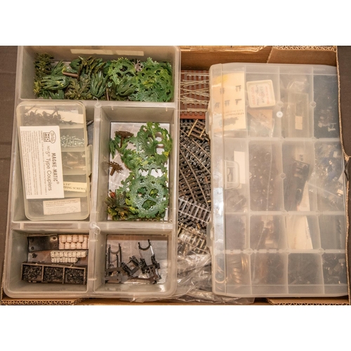 42 - A good quantity of OO gauge railway accessories. Including a good number of card lineside buildings ... 