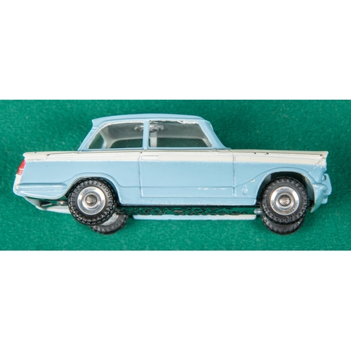 443 - Dinky Toys Triumph Herald (189). An example in light blue and white. Boxed. Vehicle VGC. 
A few smal... 