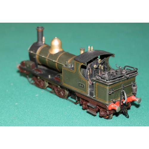 53 - A fine quality brass OO gauge 2-rail electric GWR Dean 0-4-4 tank locomotive, RN 34. In lined Brunsw... 