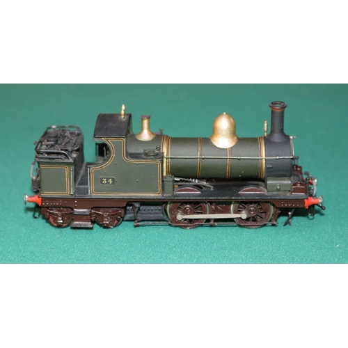 53 - A fine quality brass OO gauge 2-rail electric GWR Dean 0-4-4 tank locomotive, RN 34. In lined Brunsw... 