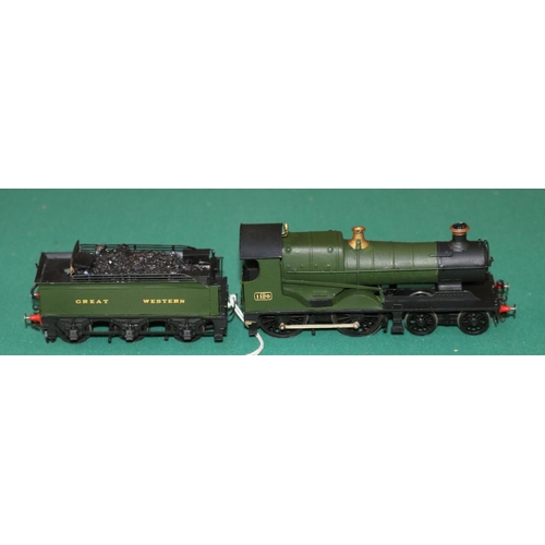 69 - A OO gauge 2-rail electric brass kit built GWR 4-4-0 Bulldog Class tender locomotive, RN 1120. In un... 