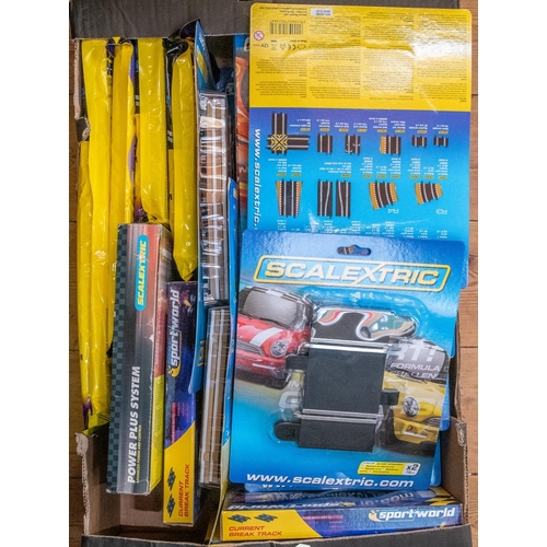 86 - A large quantity of Scalextric track packs and accessories. Includes Scalextric digital lap counter,... 