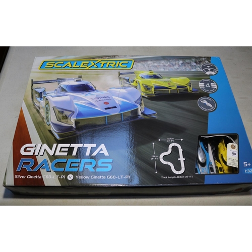 88 - Scalextric Ginetta Racers 1:32 scale. Contains a silver Ginetta G60-LT-P1, and a yellow Ginetta G60-... 