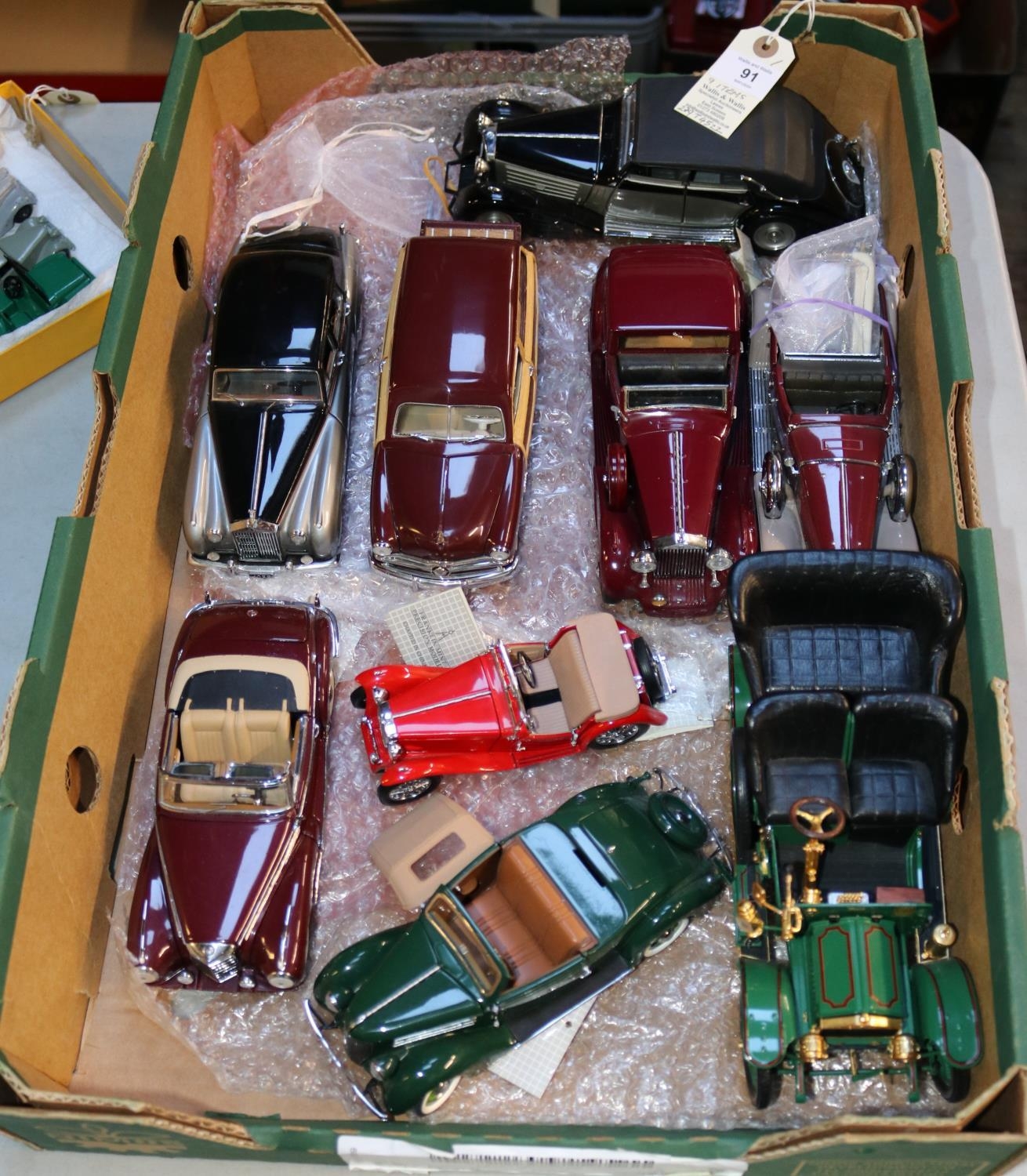 9 Franklin mint cars. 1936 Ford in green, no hood, comes with the tie