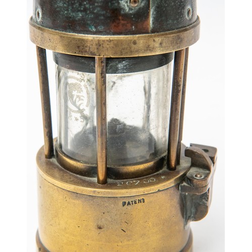 21 - An miner's old brass lamp, 