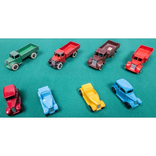 280 - 8 Dinky Toys. 4 early open back Motor Trucks (22c), all pre-war examples, green black wheels, red/bl... 