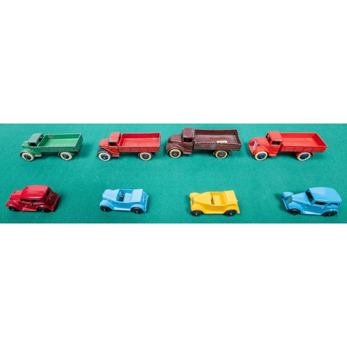 280 - 8 Dinky Toys. 4 early open back Motor Trucks (22c), all pre-war examples, green black wheels, red/bl... 