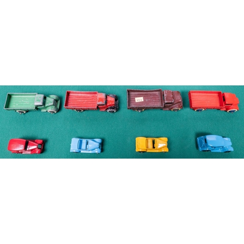 280 - 8 Dinky Toys. 4 early open back Motor Trucks (22c), all pre-war examples, green black wheels, red/bl... 