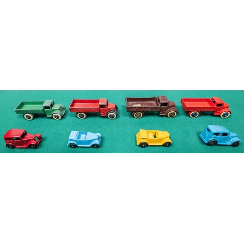 280 - 8 Dinky Toys. 4 early open back Motor Trucks (22c), all pre-war examples, green black wheels, red/bl... 