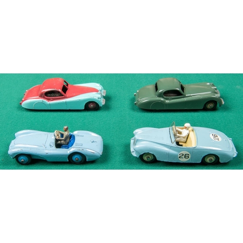 309 - 4 Dinky Toys. 2x Jaguar XK120 in dark green with light brown wheels and in turquoise and cerise with... 