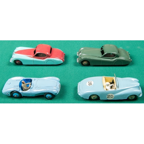 309 - 4 Dinky Toys. 2x Jaguar XK120 in dark green with light brown wheels and in turquoise and cerise with... 