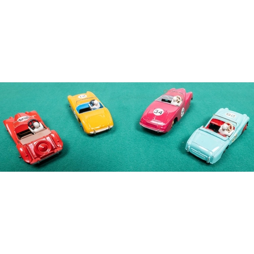 310 - 4 Dinky Toys competition cars. Triumph TR3 in turquoise with red interior and wheels, RN25. Sunbeam ... 