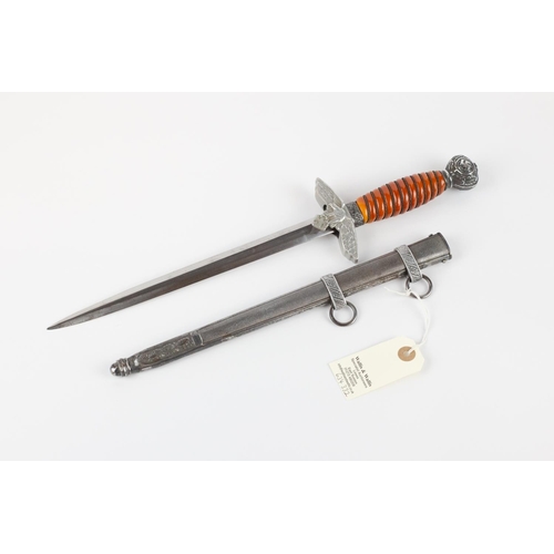 111 - A Third Reich 2nd pattern Luftwaffe officer's dagger, by WKC, Solingen, with wire bound orange plast... 