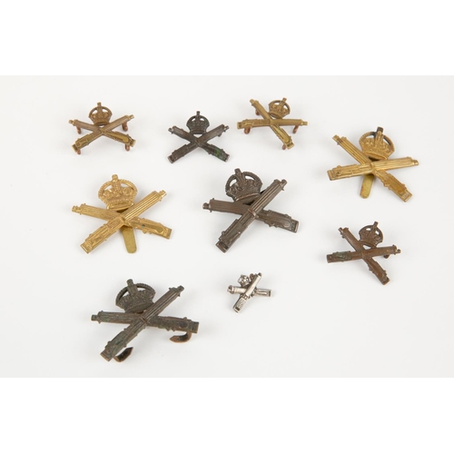 150 - Machine Gun Corps badges: officer's bronze cap with blades (2); OR's brass with slider (2); pair off... 