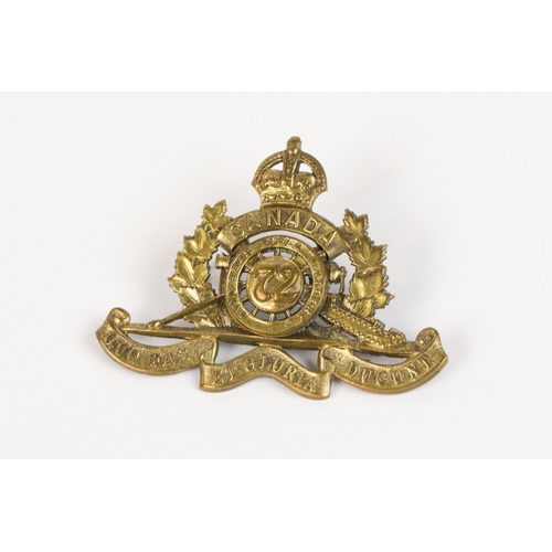 167 - WWI CEF cap badge of the 72nd Overseas Field Battery Canadian Field Artillery, with two brass lugs. ... 