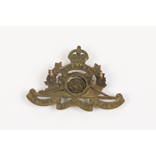 167 - WWI CEF cap badge of the 72nd Overseas Field Battery Canadian Field Artillery, with two brass lugs. ... 