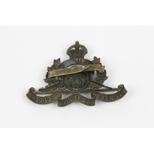 168 - WWI CEF cap badge of the 73rd Overseas Field Battery Canadian Field Artillery, with 2 brass prongs. ... 