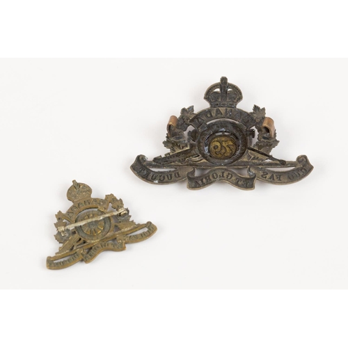 169 - WWI CEF cap badge of the 79th Overseas Field Battery Canadian Field Artillery, with two brass prongs... 