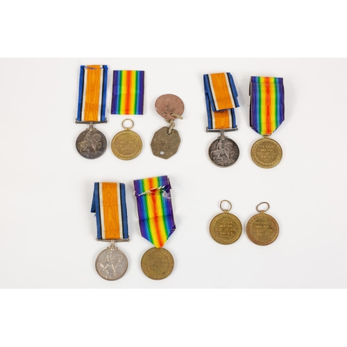 49 - A small collection of WWI medals to the Smethurst family comprising Pairs: BWM, Victory (3205 Gnr J ... 