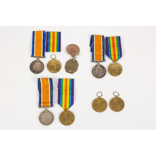 49 - A small collection of WWI medals to the Smethurst family comprising Pairs: BWM, Victory (3205 Gnr J ... 