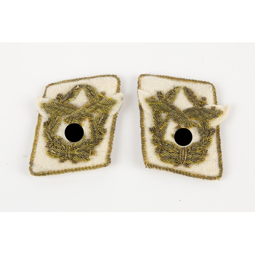 69 - A pair of Third Reich Luftwaffe collar patches for an Air Marshal, with gold bullion embroidered dev... 