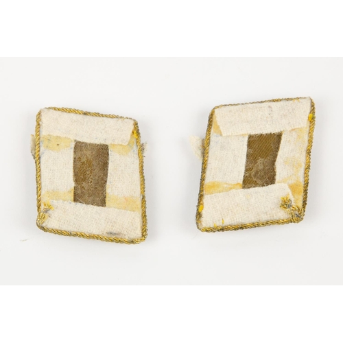 69 - A pair of Third Reich Luftwaffe collar patches for an Air Marshal, with gold bullion embroidered dev... 