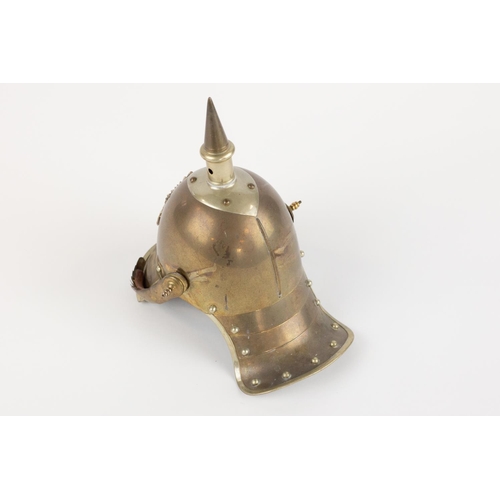 83 - A miniature Imperial German Garde Cuirassier metal helmet, of correct colour metal with white metal ... 