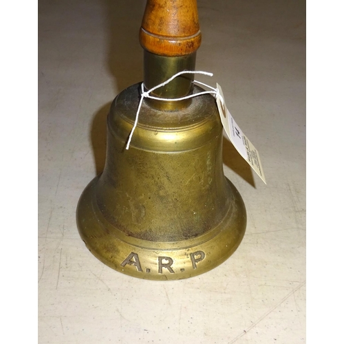 14 - A WWII ARP brass hand bell, turned wood handle, 10¼