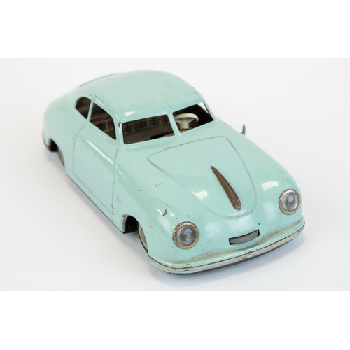 102 - A scarce JNF prototyp Porsche, tin plate clockwork model car in light blue. Made in Germany US zone,... 