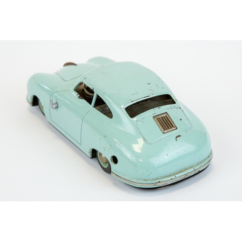 102 - A scarce JNF prototyp Porsche, tin plate clockwork model car in light blue. Made in Germany US zone,... 