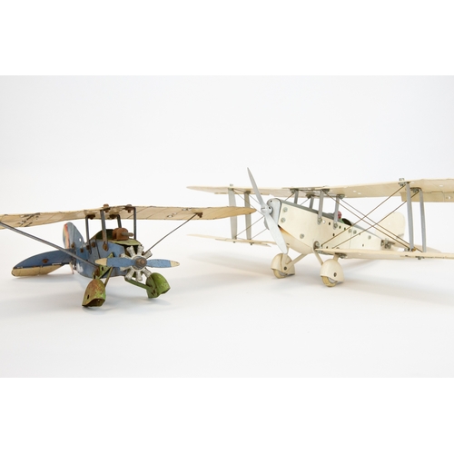 103 - 2 Meccano tinplate aeroplanes. Made up as a single engine Bi-Plane in cream and grey, complete with ... 